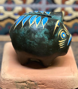 Small clay piggy bank